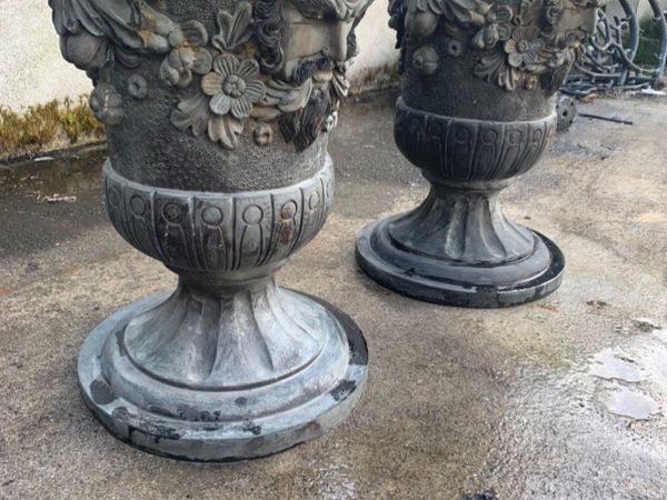 Pair of old bronze french urns