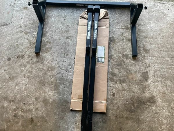 rigid rack, barbell, weights and bench