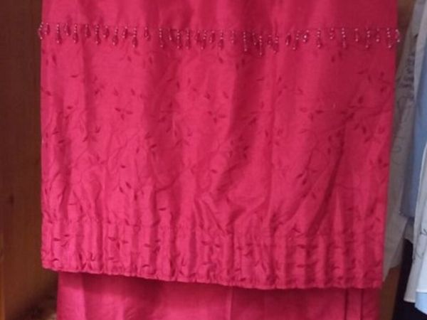 2 Pairs of Red curtains.