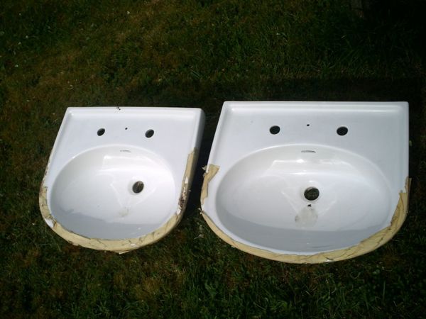 wash basins, surplus to requirements.