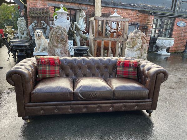 Antique brown leather cheaterfield sofa