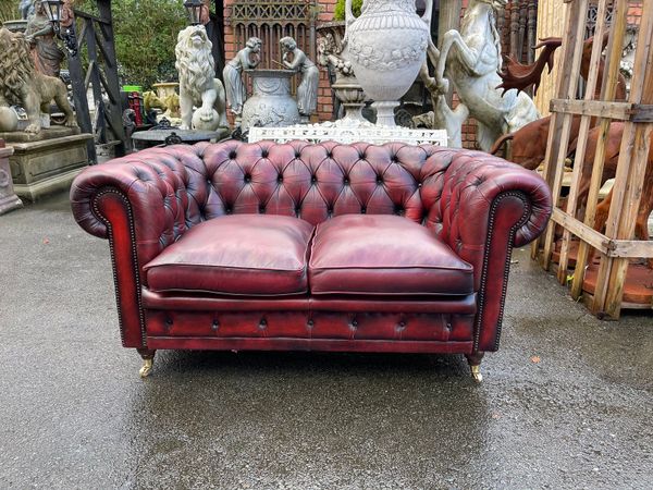 Oxblood red leather Chesterfirled sofa