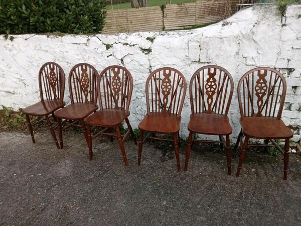 6 Wheel Back dining chairs
