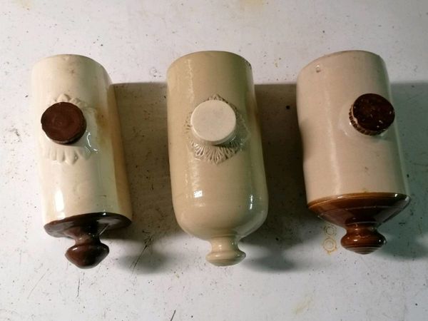 Antique hot water bottles,