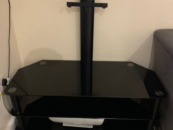 Tv stand and table, the tv attaches to the back or