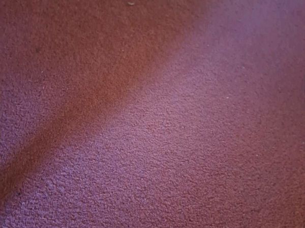 Dusky pink carpet.
