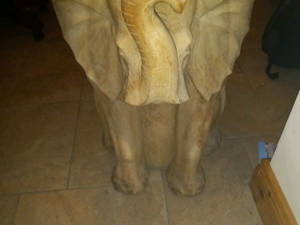 Hand carved elephant chair