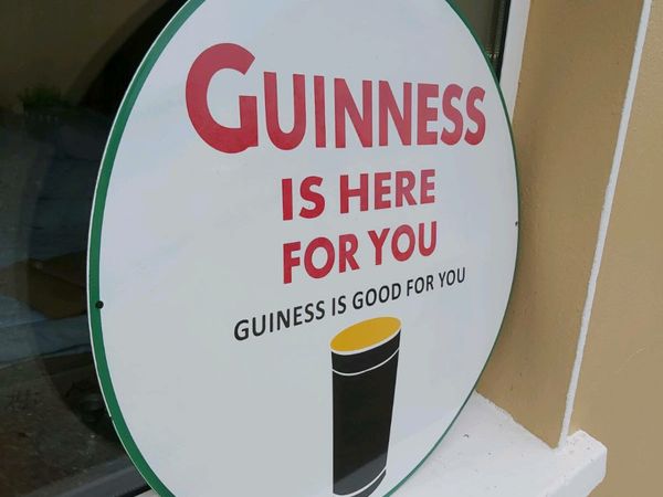 Large  enamel  Guinness  sign