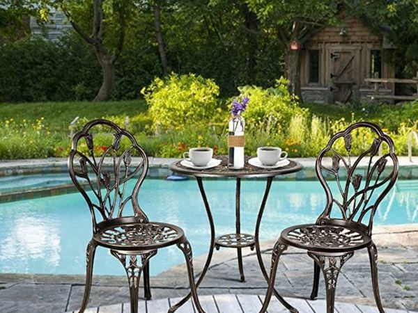 Three-piece garden set with a bistro table and two chairs, garden furniture, and vintage garden decor for balconies,
