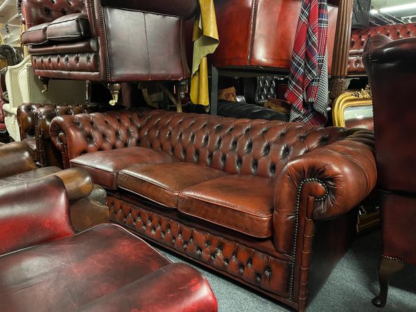 Oxblood red leather chesterfield sofa