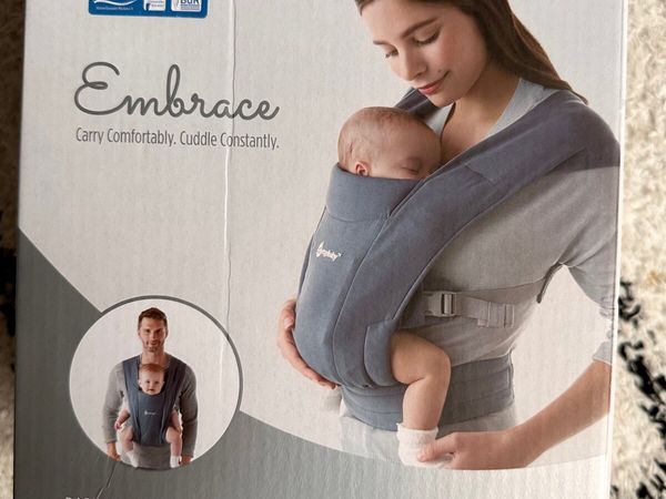 Ergonomic newborn carrier embrace
