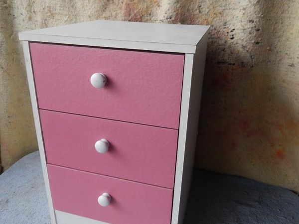 pink and white bedside table