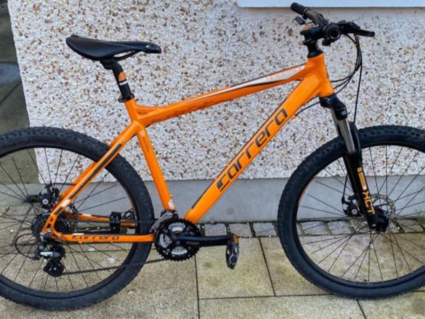 Carrera mountain cheap bike orange