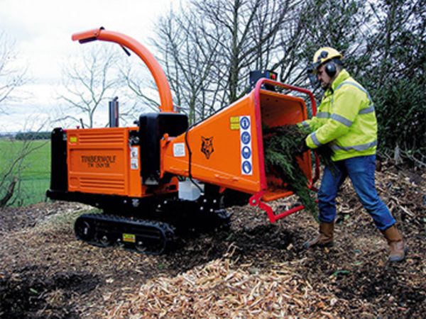 Man and wood chipper hire