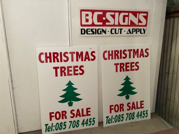 Christmas tree sign for sale.