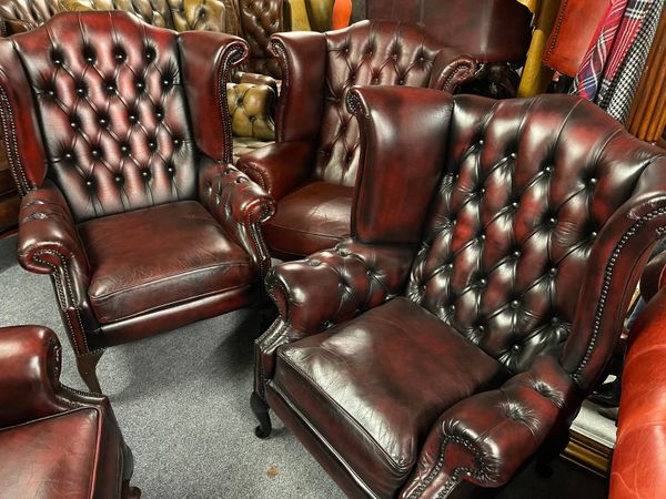 Oxblood red leather queen Ann chairs