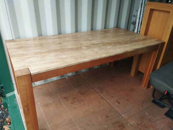 Dining Table with marble top finish.
