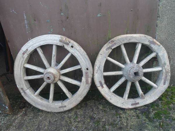 2 old rustic cart wheels