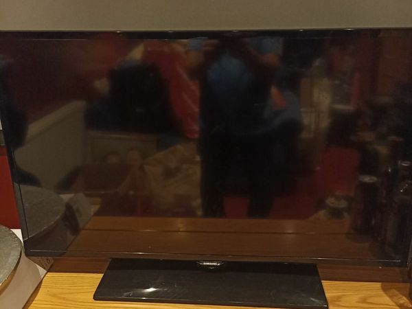 Tv and stand with sound bar and subwoofer