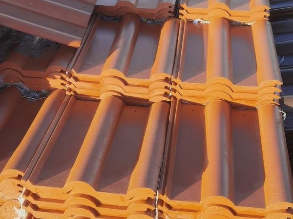 Polymer roof tiles