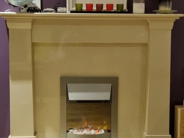 Fireplace with electric fire