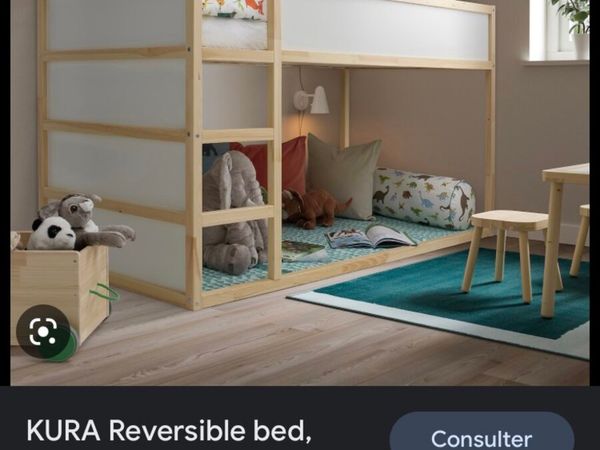 Ikea Kura reversible bunk with dinosaur canopy