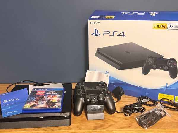 PlayStation 4 boxed with extras