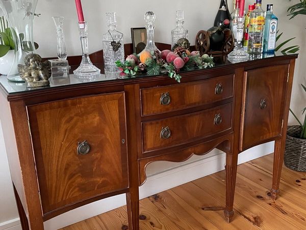 Antique sideboard and antique table with 8 chairs