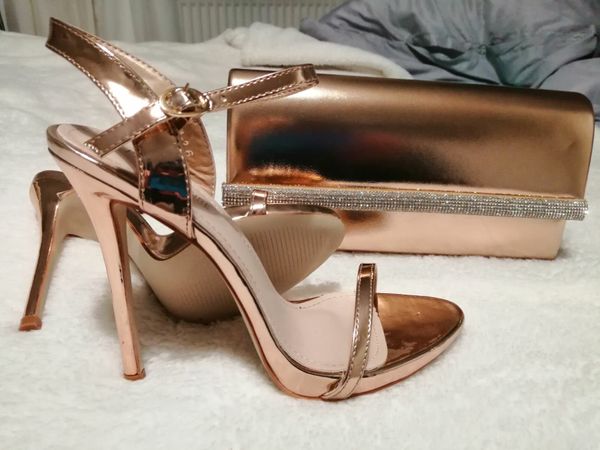Rose gold heels & clutch bag