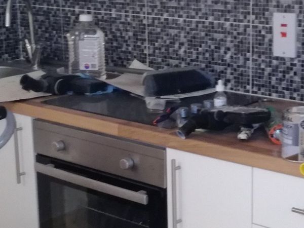 Electric hob , oven , extractor fan