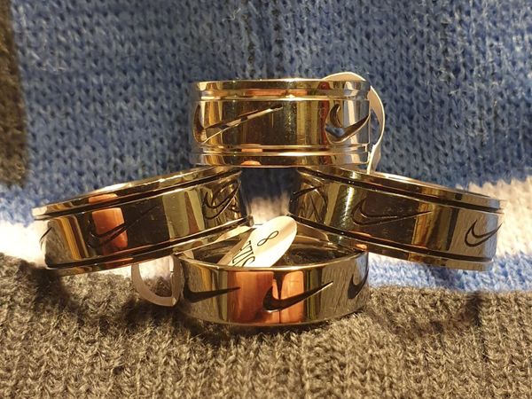 "Nike" branded Silver Band Rings