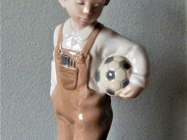 NAO by Lladro Figurine of young boy, circa 1988