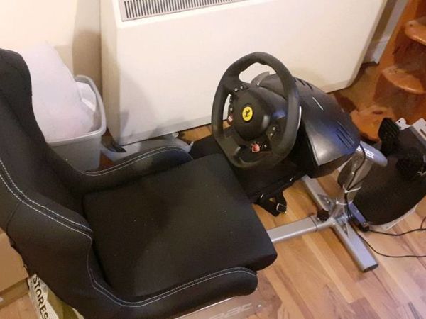Ps4 play seat,  steering wheel and pedals.