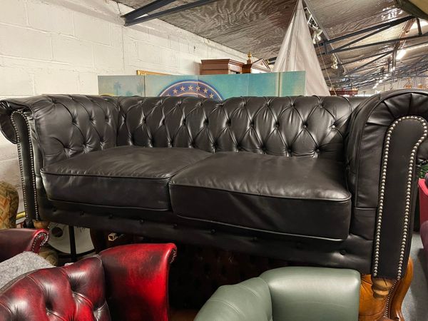Black chesterfield sofa