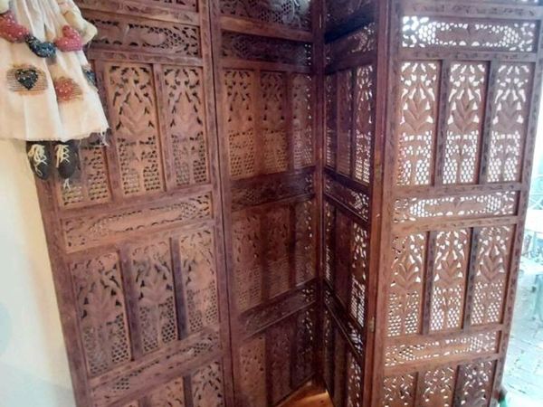 Middle Eastern ornately carved screen divider