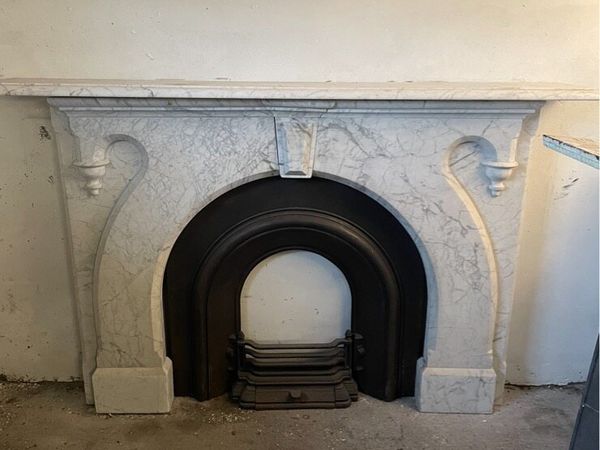 White marble antique fireplace