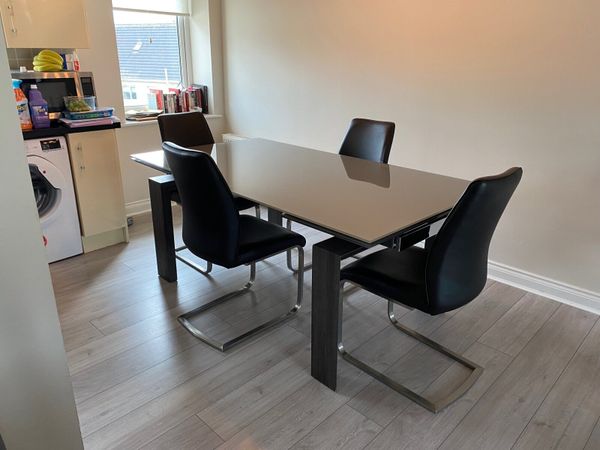 Solid wood Dining / Kitchen Table and 8 chairs for sale in Cork for €