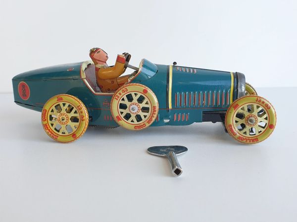 Schylling Bucatti T35 tin plate clockwork car
