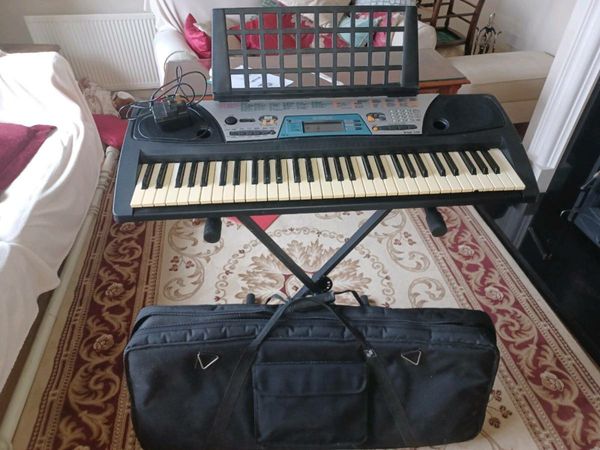 Keyboard, keyboard stand, and bag.
