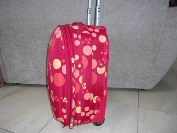CABIN SIZE RED SUITCASE