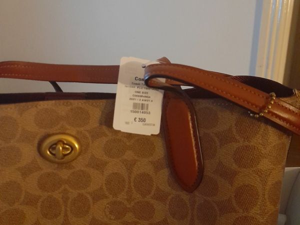 A Brand New Coach tote, Marc Jacobs bag and wallet