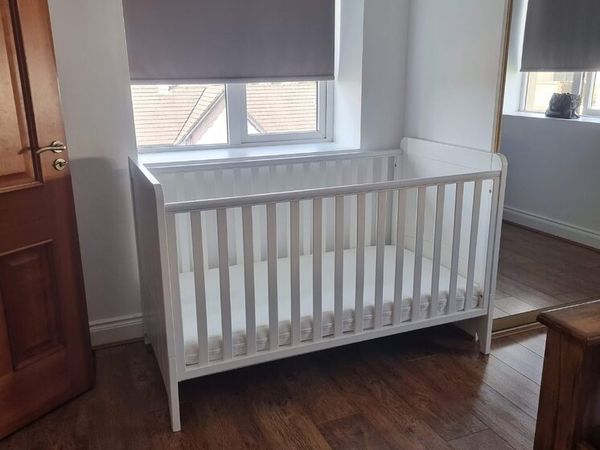 White baby and toddler  cot