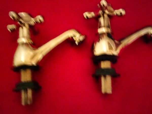 2 Old but brand new Brass taps.