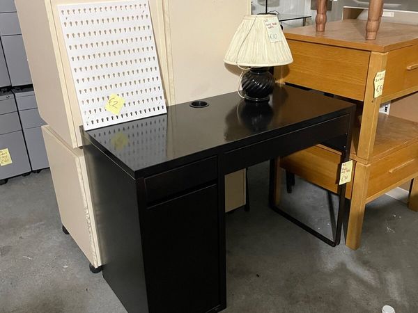 Black study desk with drawers and cabinet