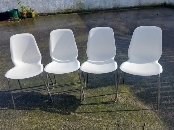 White stacking chairs €20 each