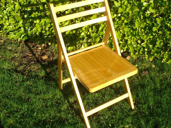 SOLID PINE FOLD UP CHAIR.