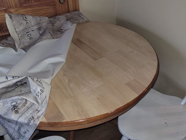 4 foot round table and 3 chairs