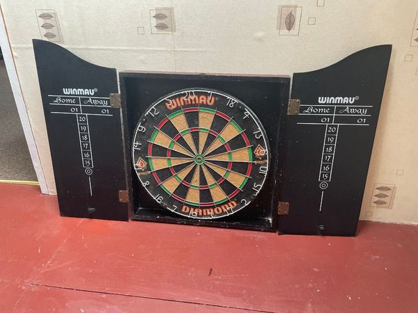 Traditional dartboard with cabinet