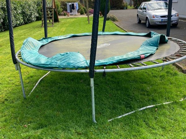 Swing set and trampoline