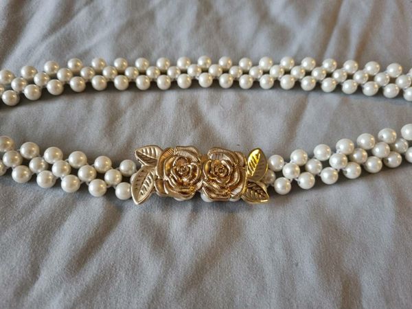 Brand new pearl bel with golden roses